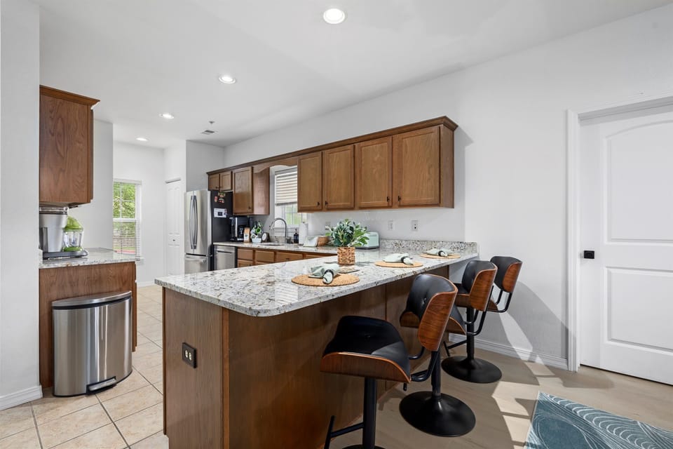 You'll be greeted by a spacious kitchen perfect for cooking and preparing meals together