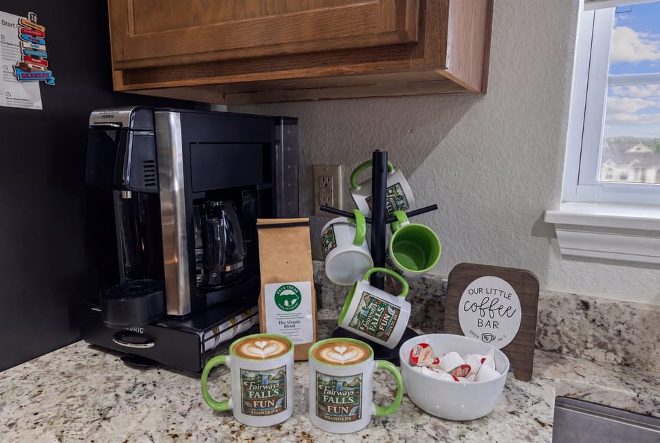 A coffee bar with both K-Cups and Drip coffee