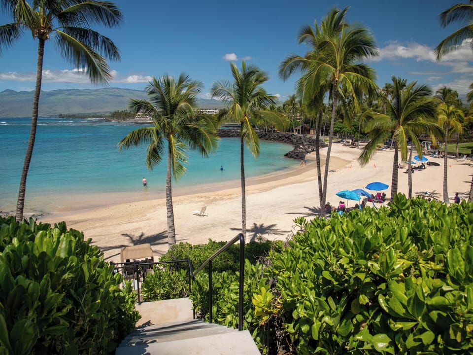 Steps down to Mauna Lani Beach Club from this home