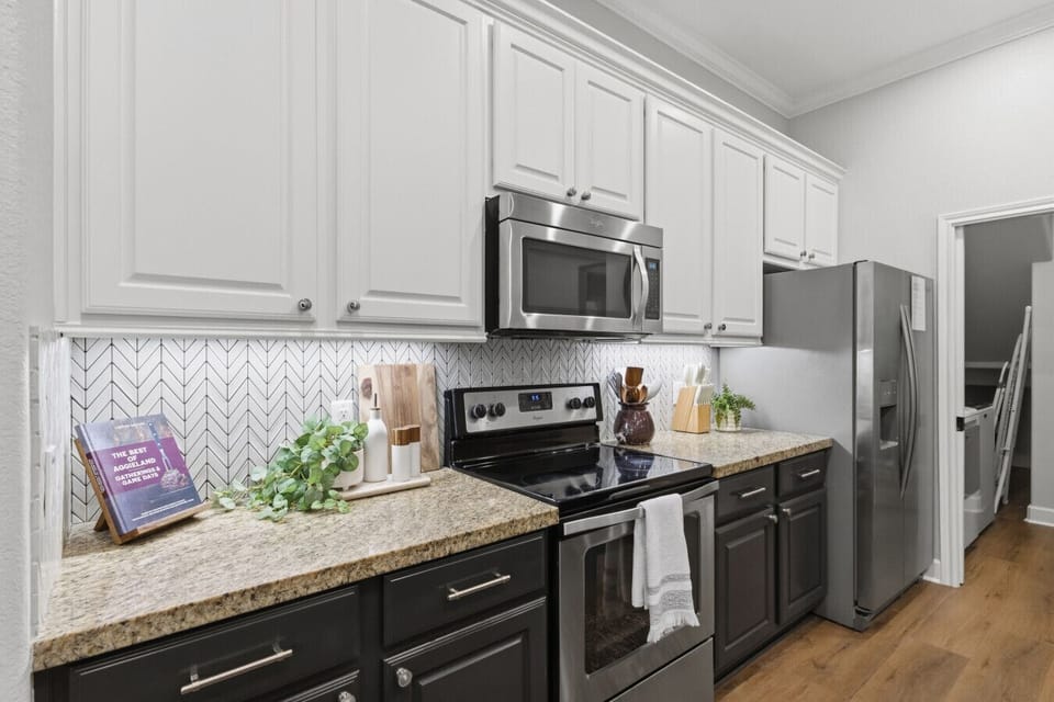 Gathering Home`s kitchen is user friendly and stocked with essentials.