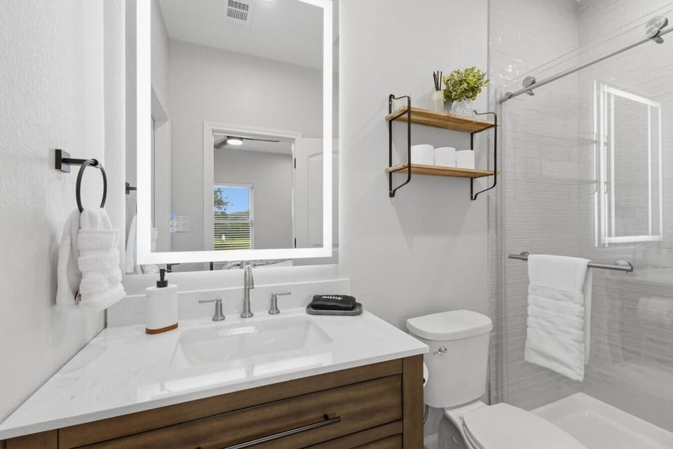 You’ll find the necessities in Bedroom 2’s ensuite bathroom, including fresh towels, toilet paper, and a hair dryer.