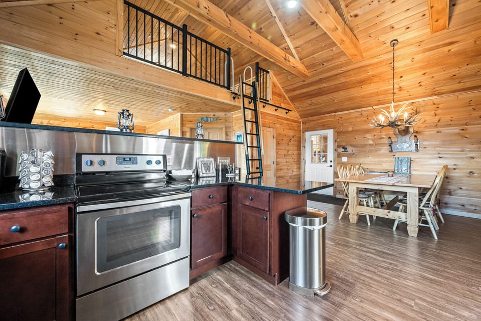 Full kitchen with views of loft and dining area