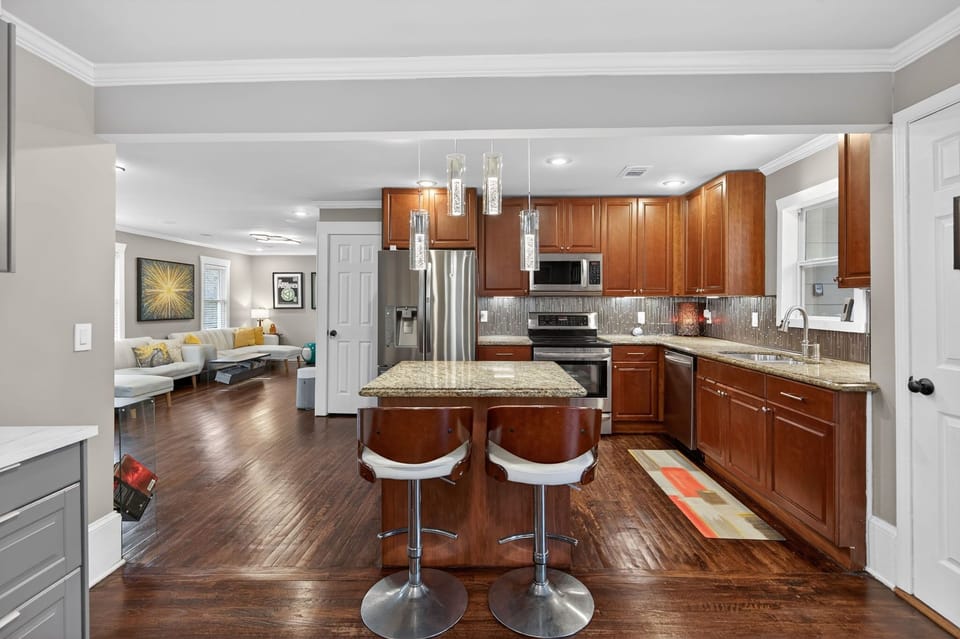 Open kitchen flows into living space, ideal for families & group stays