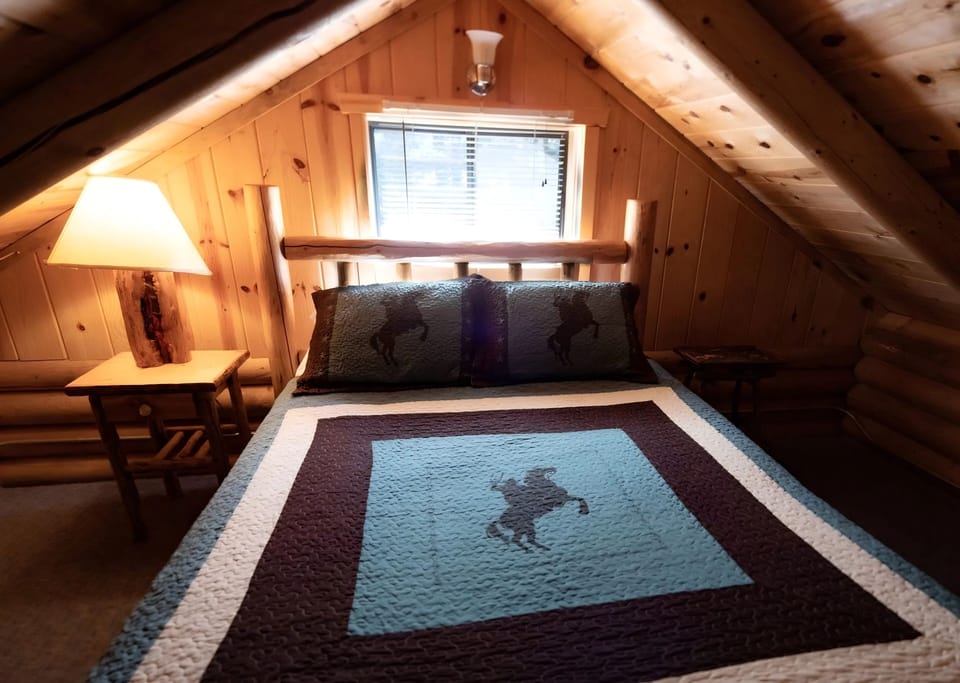 Cowboy Cabin loft queen bed
