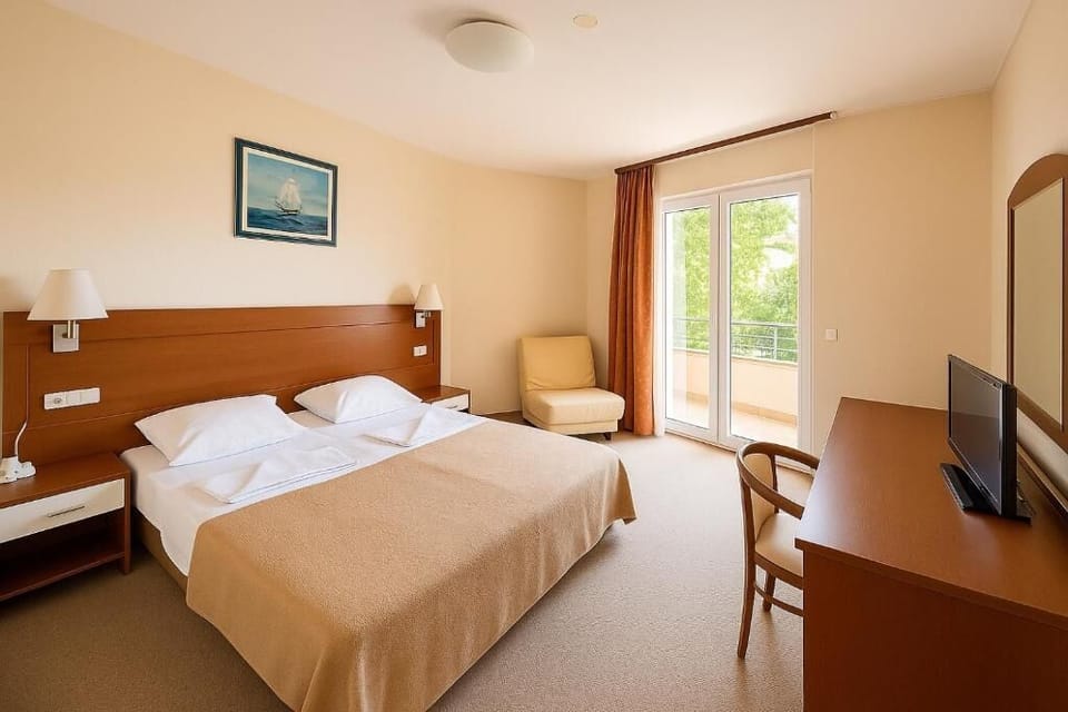 Family Room, 1 Bedroom, Balcony, Partial Sea View | Desk, laptop workspace, free WiFi
