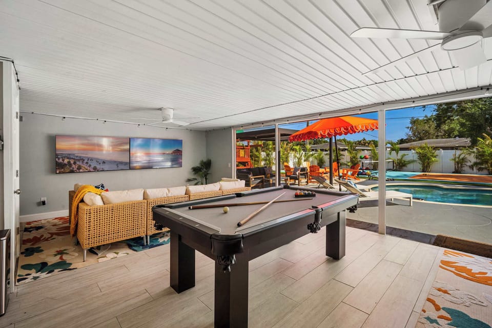 Game Room: Enjoy friendly competition with pool and stunning views of the sparkling pool!