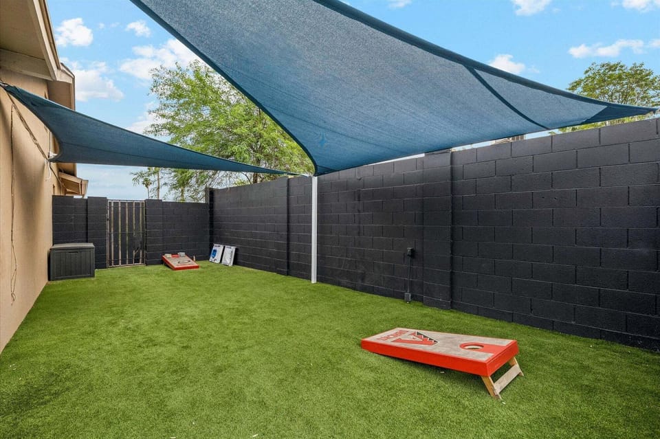 Sun-sails and cornhole boards.