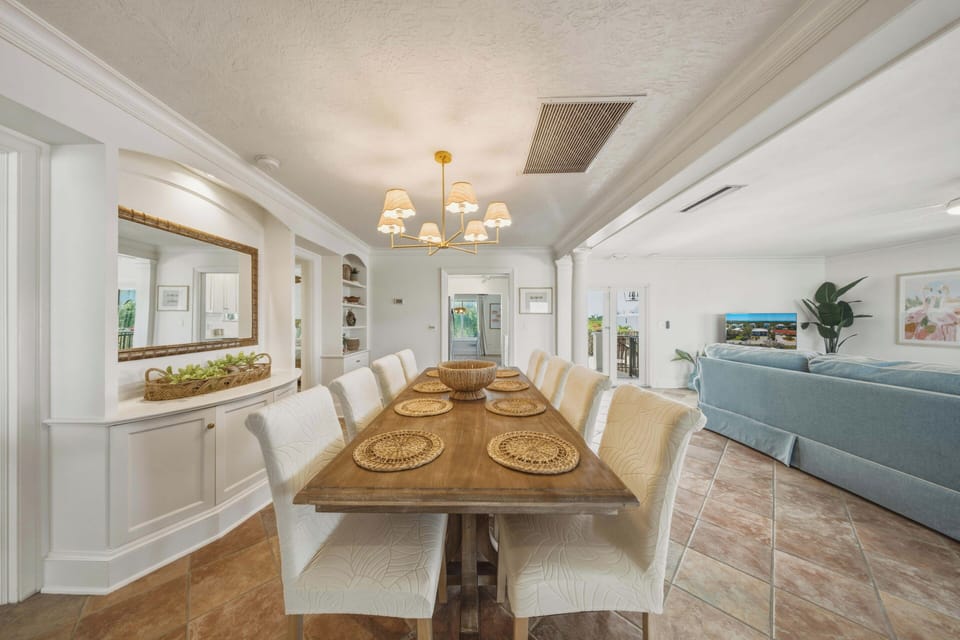 This inviting dining area offers plenty of seating and is ideal for sharing meals after a day at Sombrero Beach or out on the water.