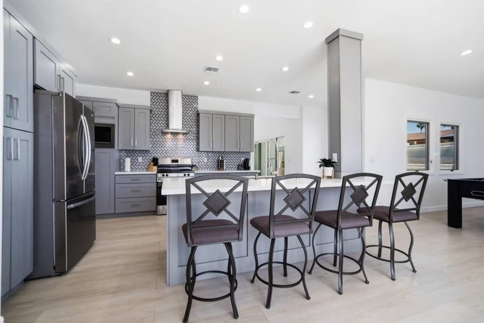 Open kitchen with island seating and plenty of space to gather.