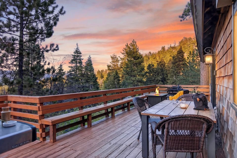 Golden hour over the pines—experience breathtaking sunset views from your private, expansive wrap-around deck.