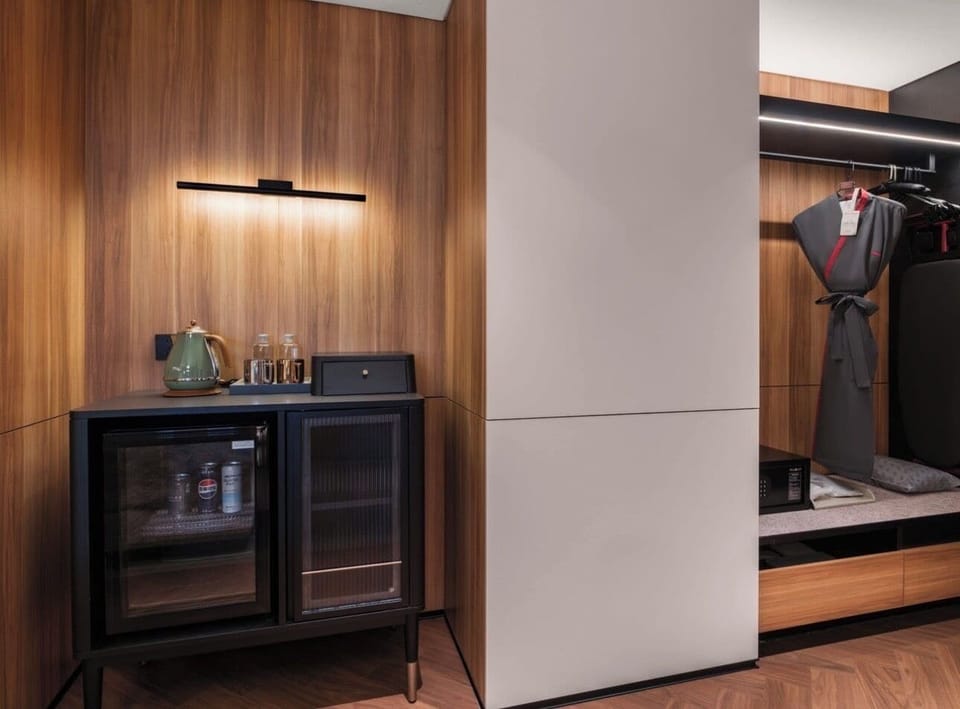 65-inch TV with digital channels, pay movies