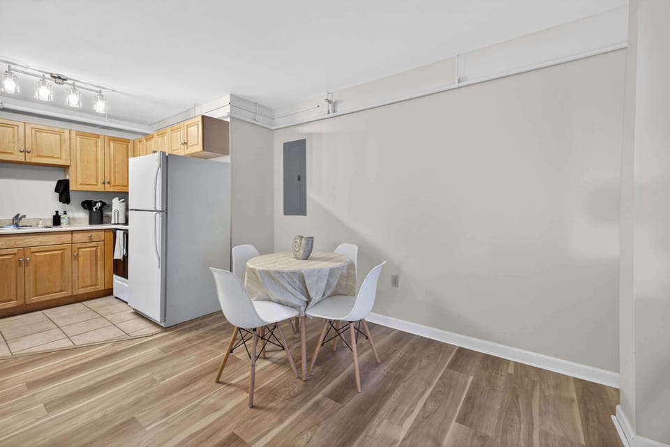 Dining area tucked beside the kitchen, ideal for casual meals or morning coffee