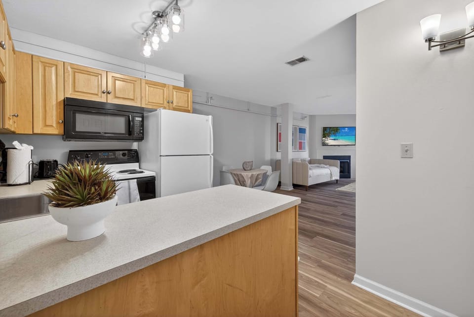 Spacious kitchen island w/ extra counter space for cooking, snacks & gathering together