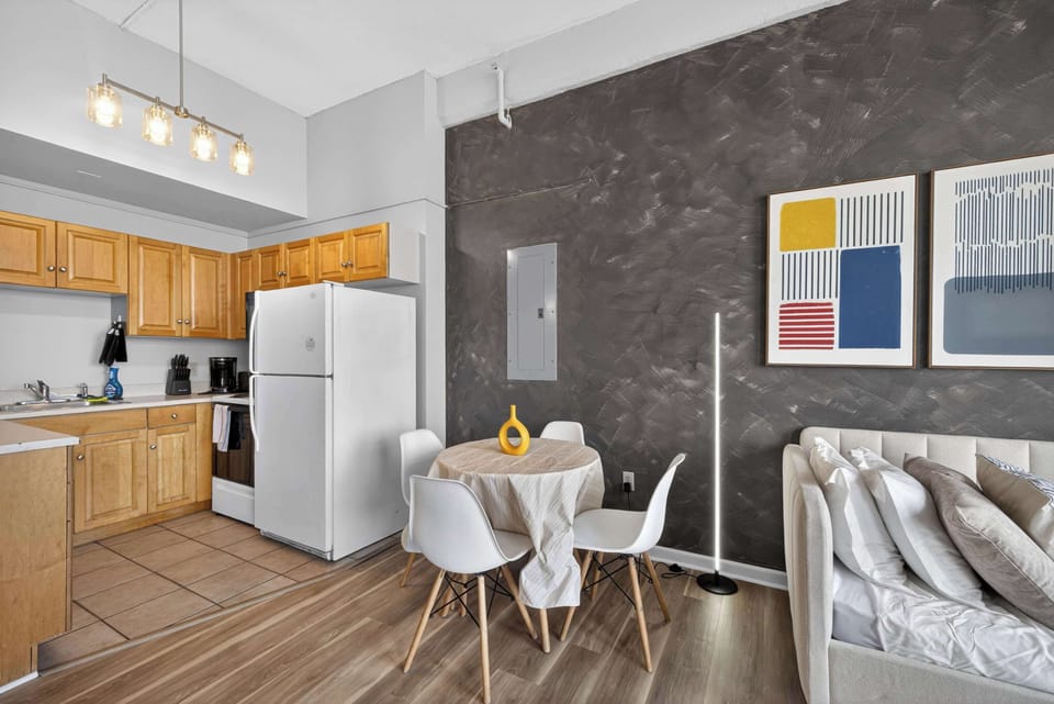 Open dining area beside the kitchen, perfect for easy breakfasts & shared meals together