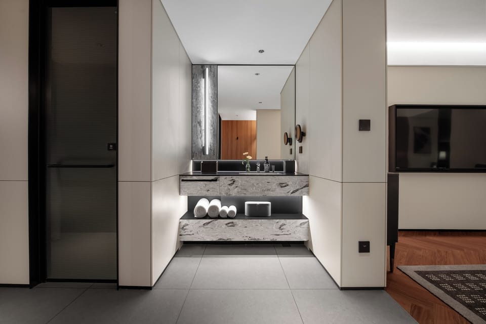 Business Double Room, City View | Living area | 65-inch LCD TV with digital channels