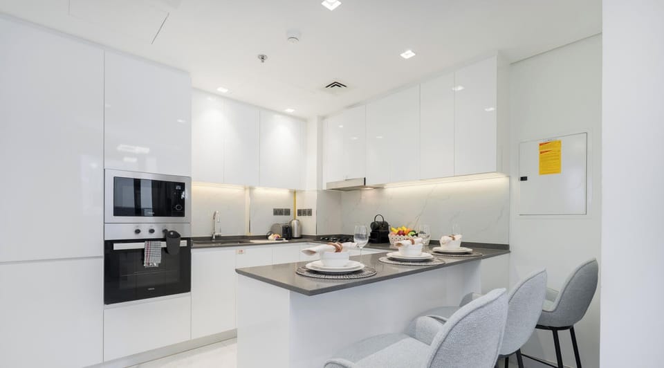 Deluxe Apartment, Balcony, City View | Private kitchen | Electric kettle, toaster, highchair, freezer