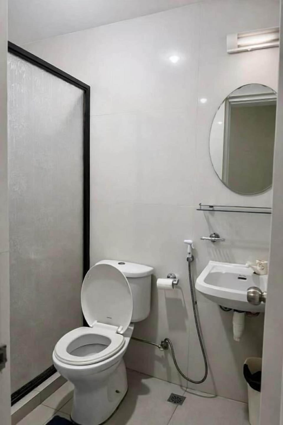 Shower, slippers, towels, soap