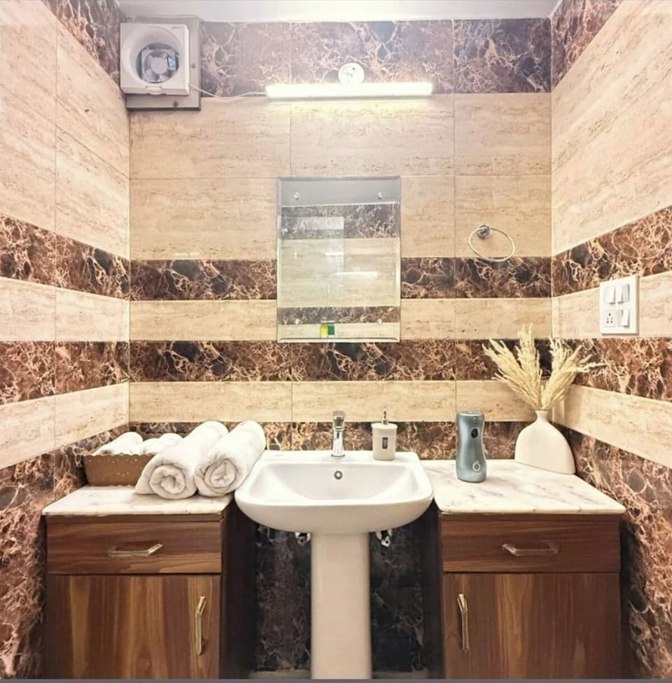 Shower, towels, soap, shampoo
