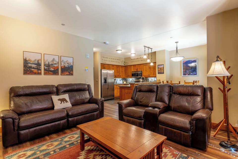 Living room opens to kitchen/dining area.