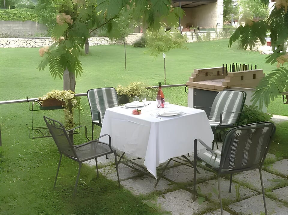 Furniture, Chair, Outdoor Furniture, Table, Outdoor Table, Shade, Garden, Umbrella, Backyard, Tablecloth