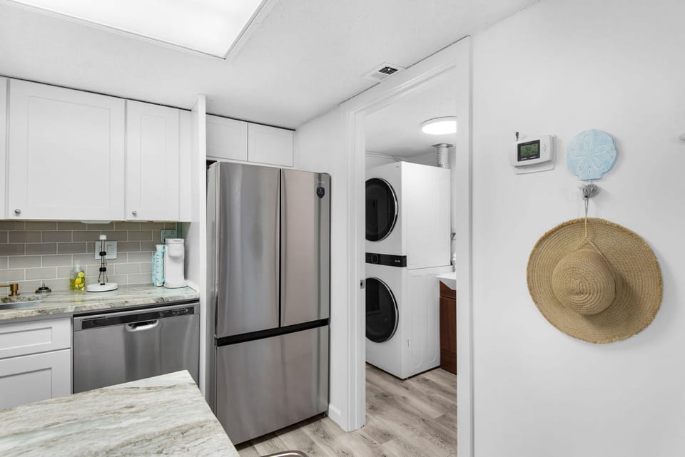 Pinnacle Port A140 Kitchen adjacent to the washer & dryer