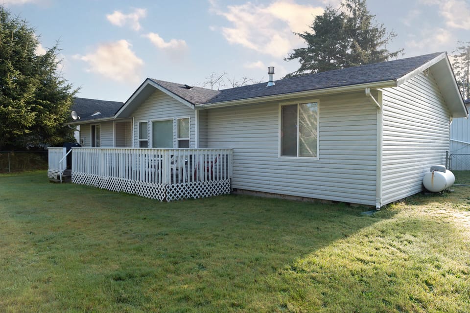 Exterior view of the home with private yard space in a quiet neighborhood.