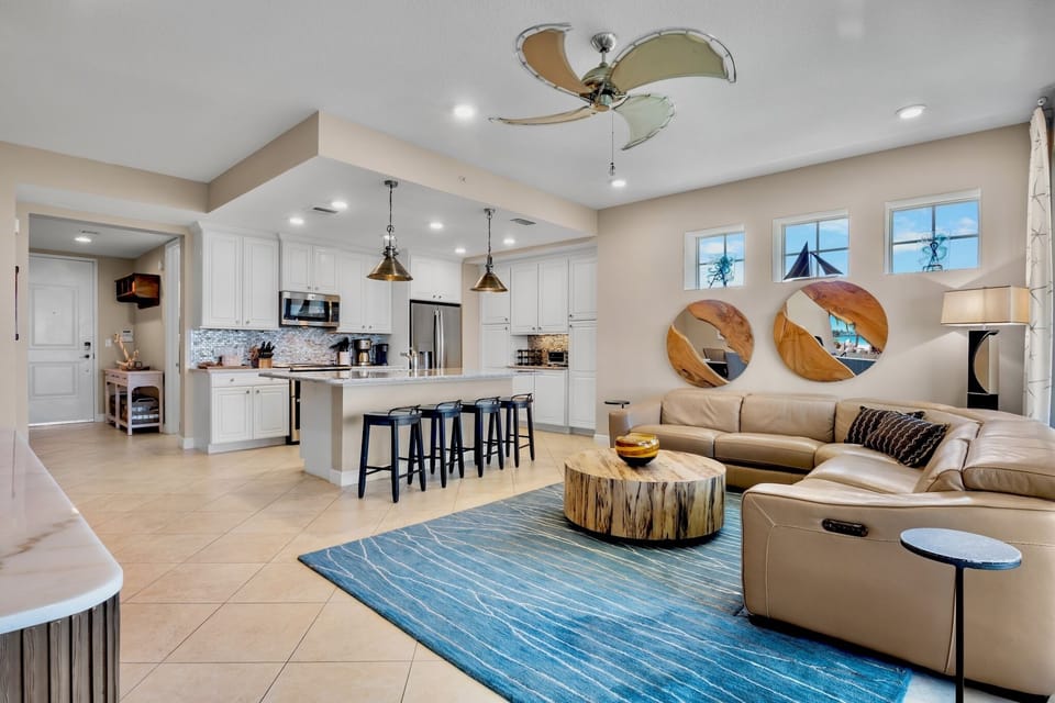 Open-concept kitchen and living area with island seating