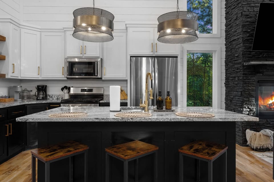 A fully equipped kitchen designed for convenience — featuring a refrigerator, microwave, and all essential appliances to make meal prep easy during your stay. ✨