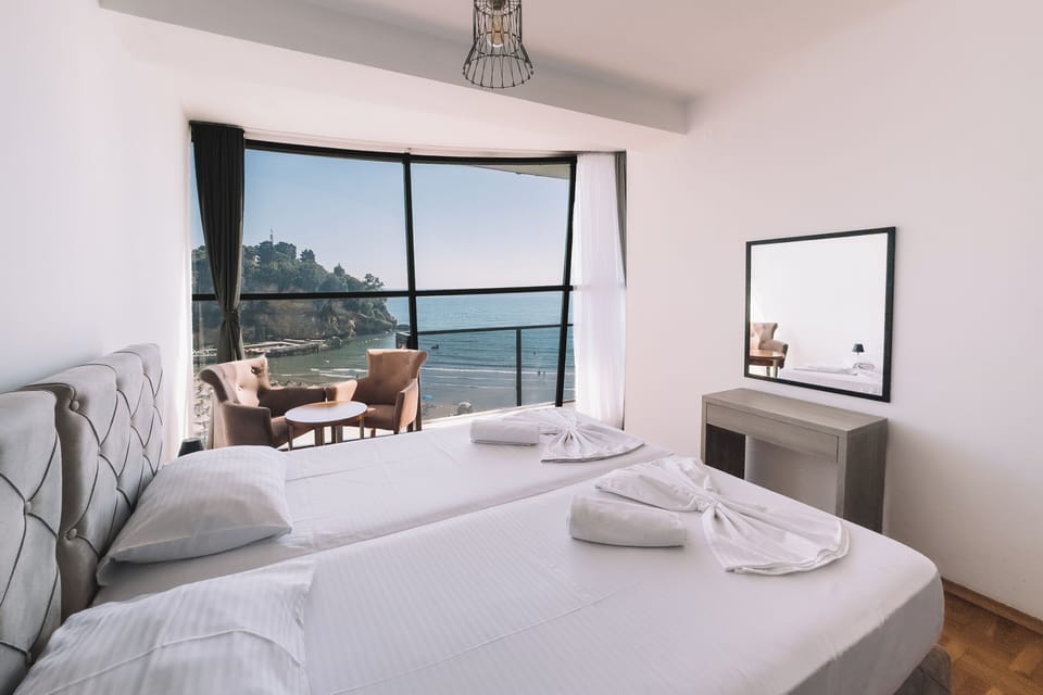 Deluxe Apartment, 2 Bedrooms, Balcony, Beach View | Premium bedding, minibar, blackout drapes, soundproofing