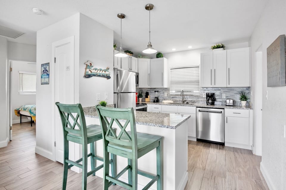 Modern coastal kitchen with island seating