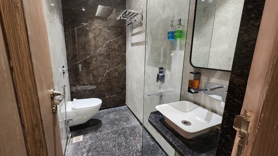 Luxury Suite, 2 Bedrooms, Non Smoking, City View | Bathroom | Shower, hair dryer, towels, soap