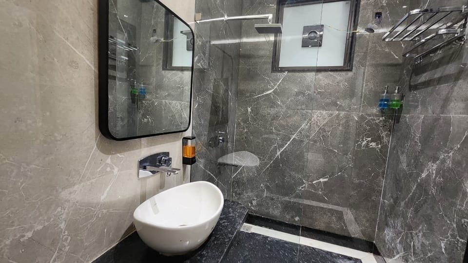 Luxury Suite, 2 Bedrooms, Non Smoking, City View | Bathroom | Shower, hair dryer, towels, soap