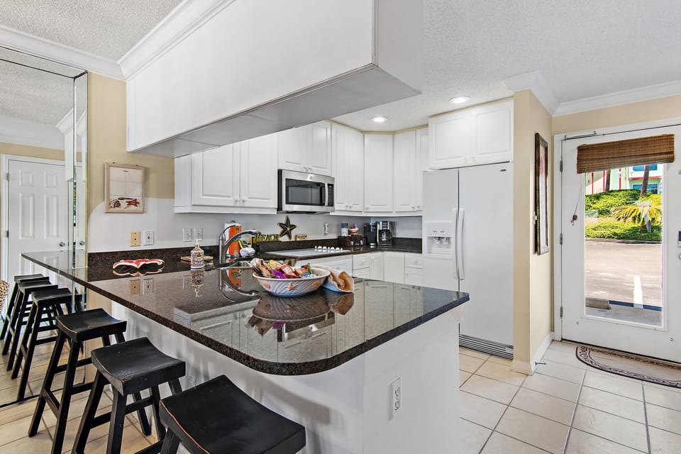 Cook delicious meals in the Fully-Stocked Kitchen while overlooking the Gulf of Mexico! 