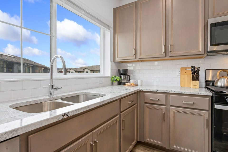 Condo, Multiple Beds, Balcony (Juniper Bloom) | Private kitchen | Coffee/tea maker