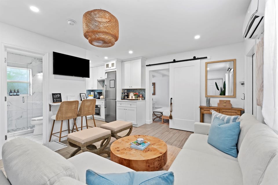 Bright and inviting lounge area with modern coastal touches throughout.