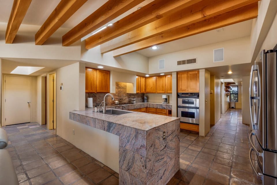 Fully equipped kitchen with generous prep space and everything you need for meals at home