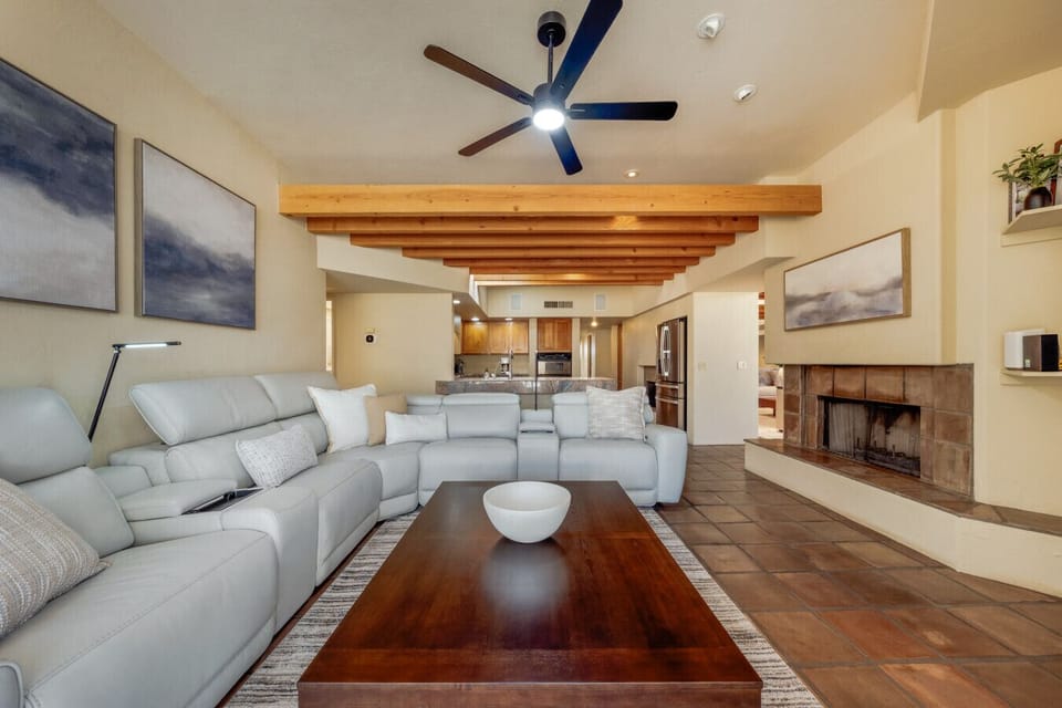 Open-concept second living room just off the kitchen with seamless indoor-outdoor living