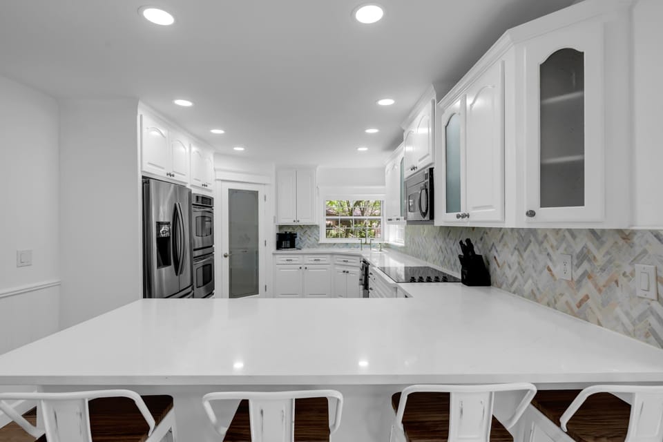 Fully Stocked Kitchen with Stainless-Steel Appliances