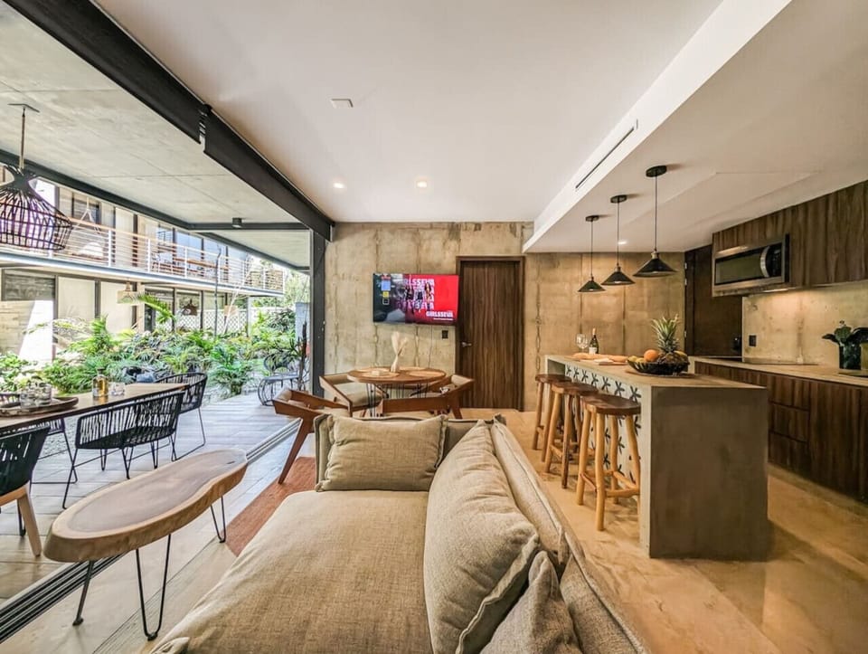Step into our cozy living room, where comfort and style blend seamlessly. Relax and unwind in this inviting space, perfect for making memories with loved ones