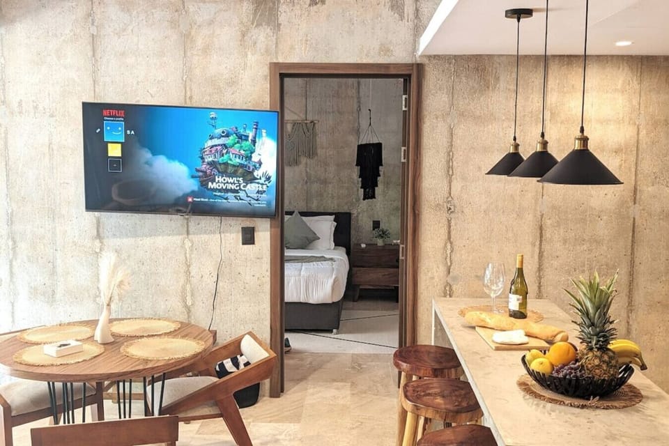 Share memorable meals and conversations in the stylish dining area, conveniently connected to the kitchen and living space.