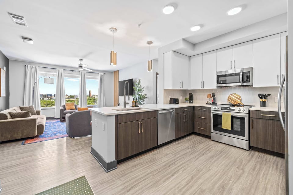 Sleek kitchen with appliances and open layout