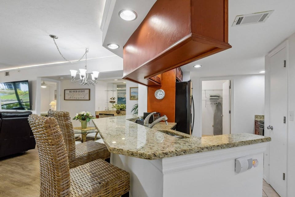 Granite breakfast bar ideal for casual dining and entertaining