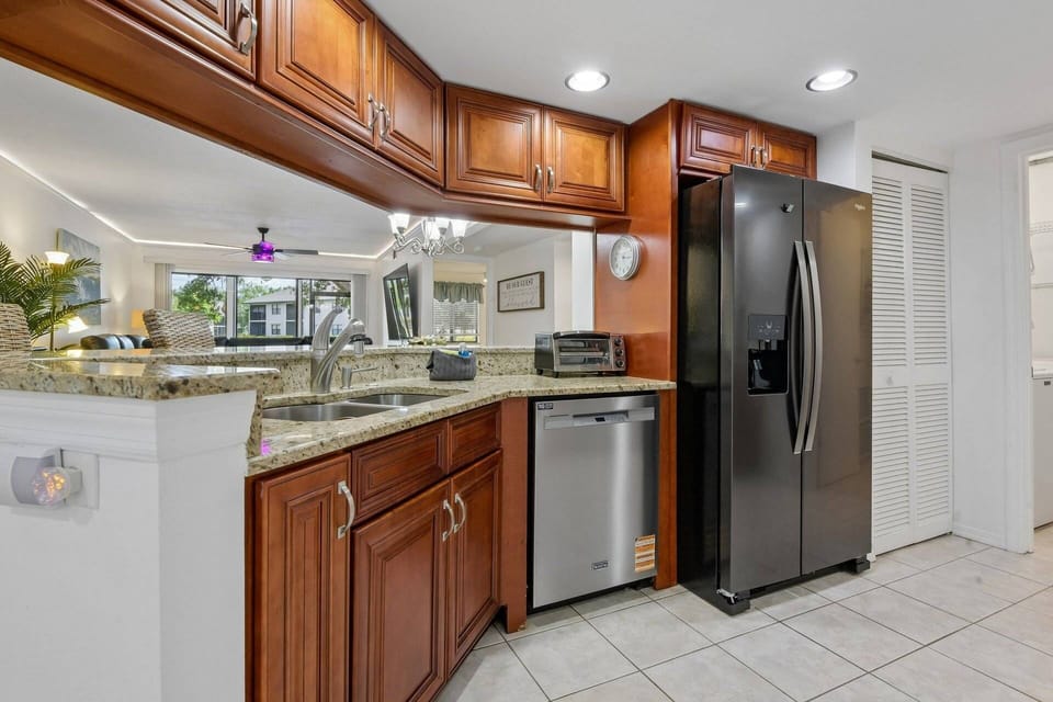 Fully equipped kitchen with updated appliances and ample prep space