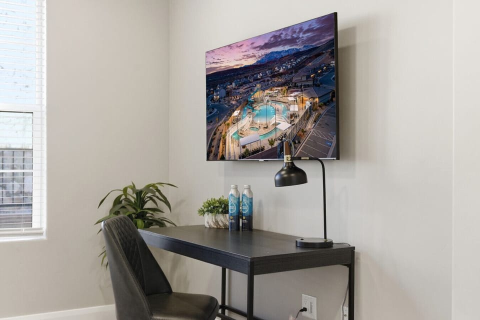 Workspace Oasis: Modern desk, sleek chair, and stunning views create your ideal productivity spot!
