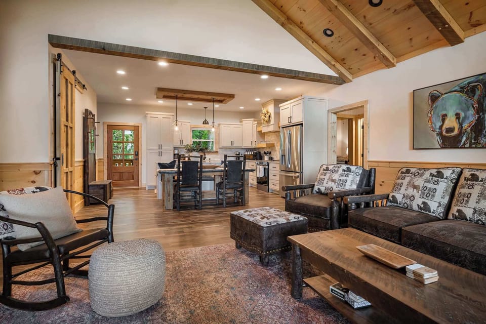 Open and inviting, our main lounge is the perfect home base for your woodland retreat.