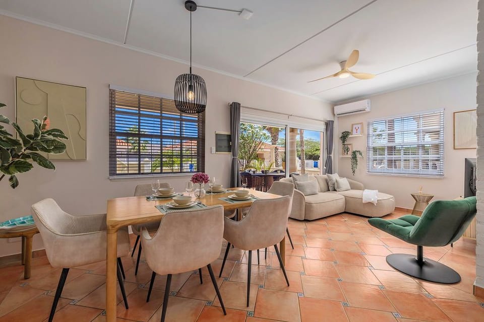 Bright dining space for shared meals and meaningful conversations in a relaxed island setting