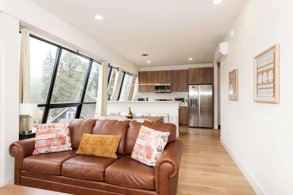 Watch your favorite shows from a comfortable couch in our stylish living room.