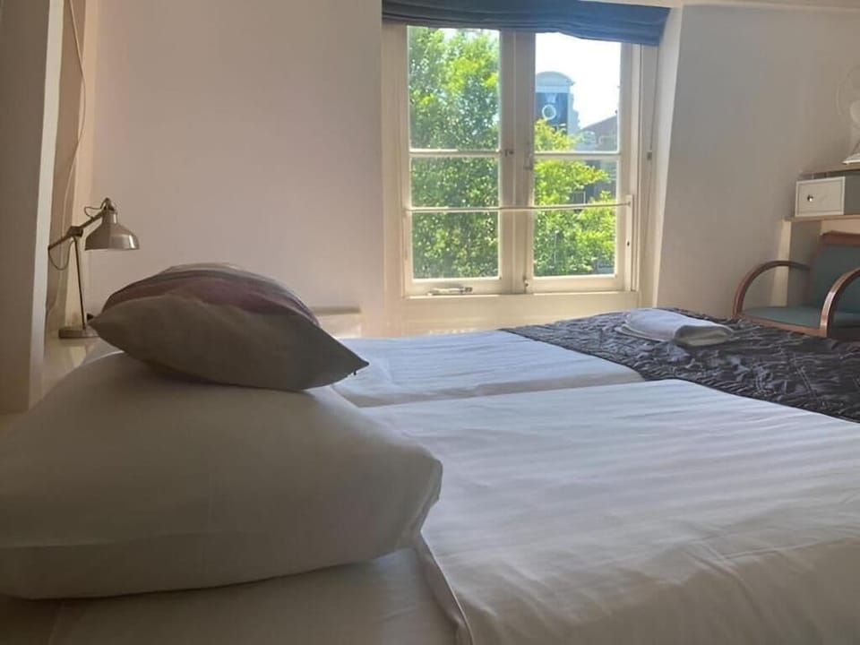 Basic Double Room, Canal View | WiFi (free), bed sheets