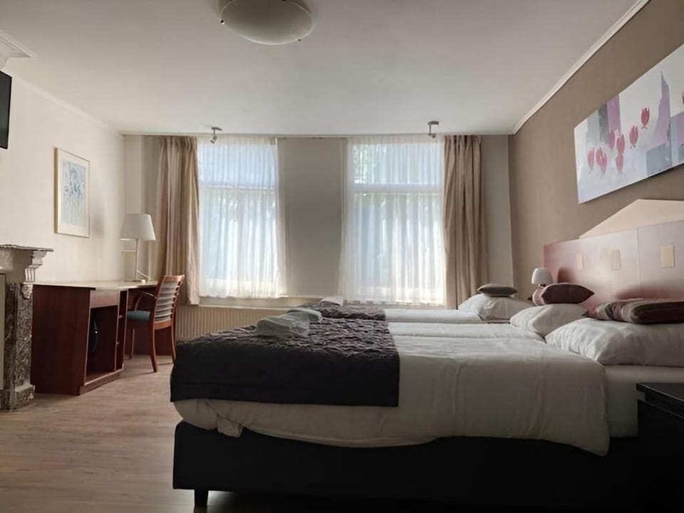 Classic Quadruple Room, Canal View | WiFi (free), bed sheets