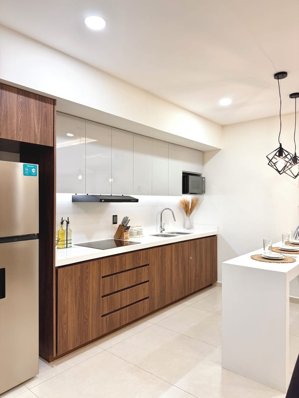 Deluxe Suite, Balcony, Beach View | Private kitchen | Mini-fridge, microwave, cookware/dishes/utensils, dining table